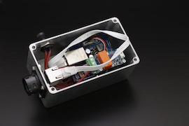 The electronics, fitting tightly in the enclosure