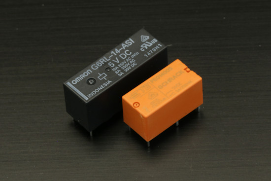 At almost the same power, there is a good reason why the black relay is longer than the orange one